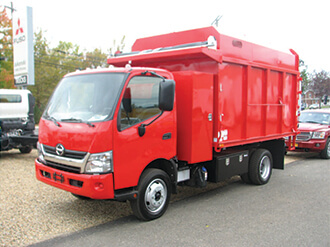 Red Hino semi truck and trailer